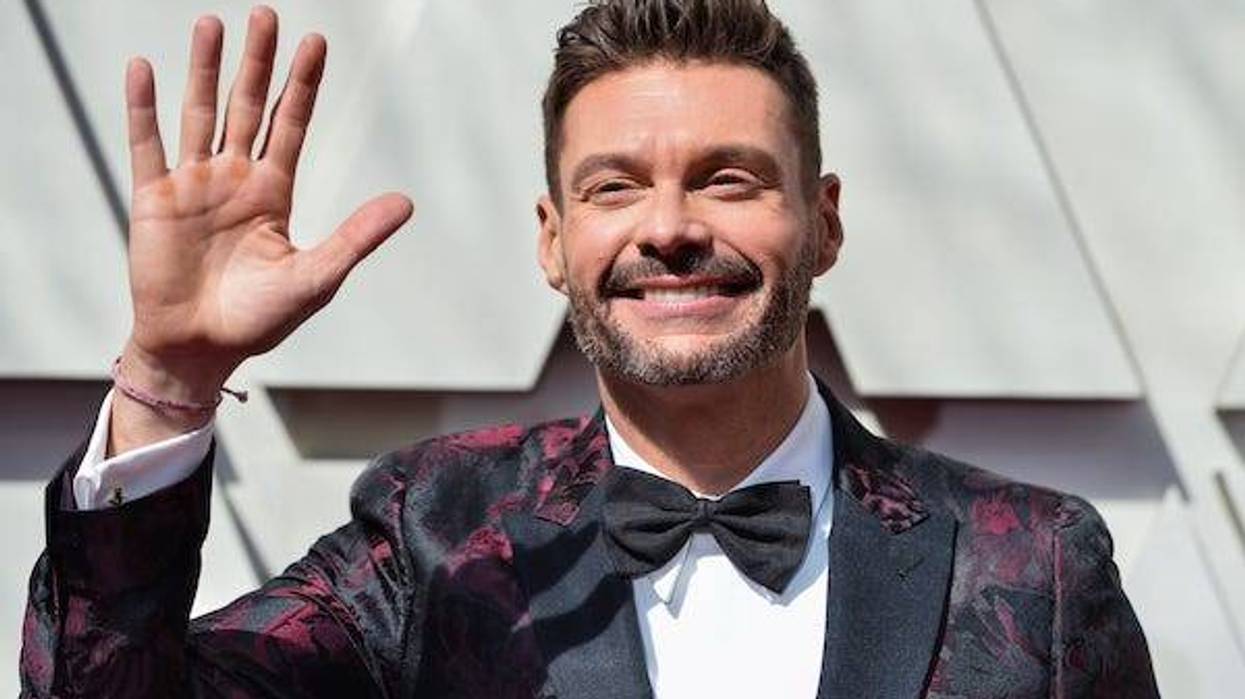Ryan Seacrest walking on the 2019 Oscars red carpet at the 91st Academy Awards
