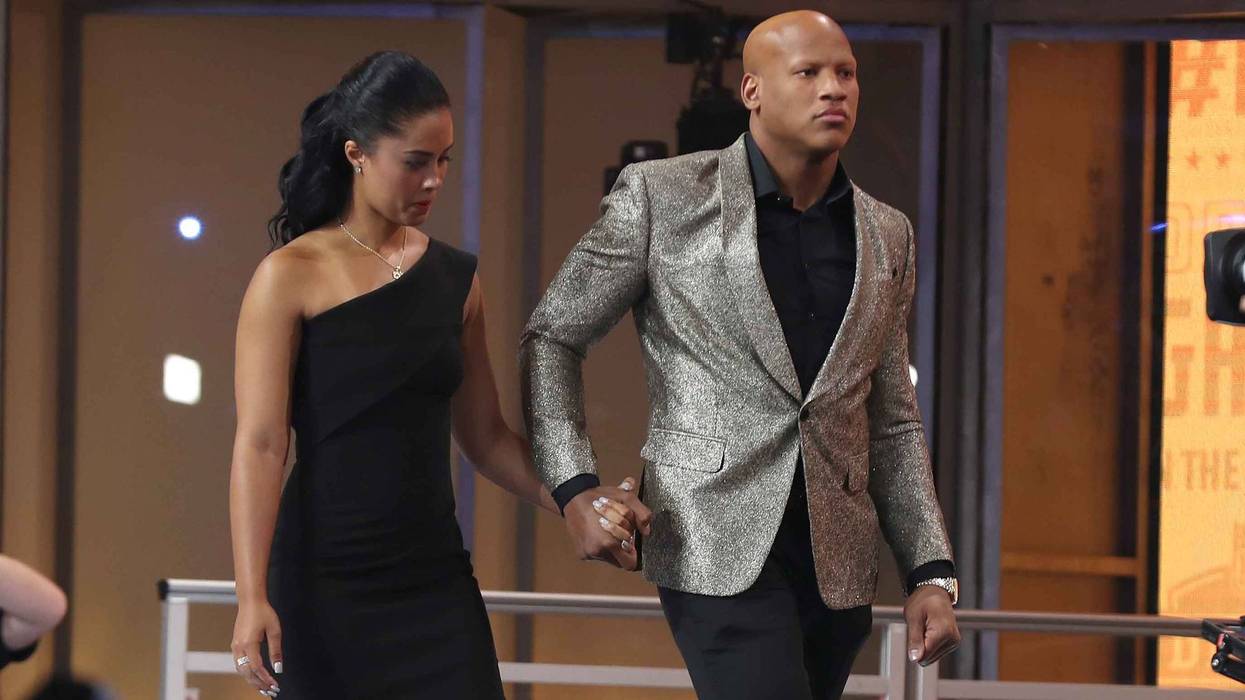 Ryan Shazier of the Pittsburgh Steelers with Michelle Rodriguez at the 2018 NFL Draft.