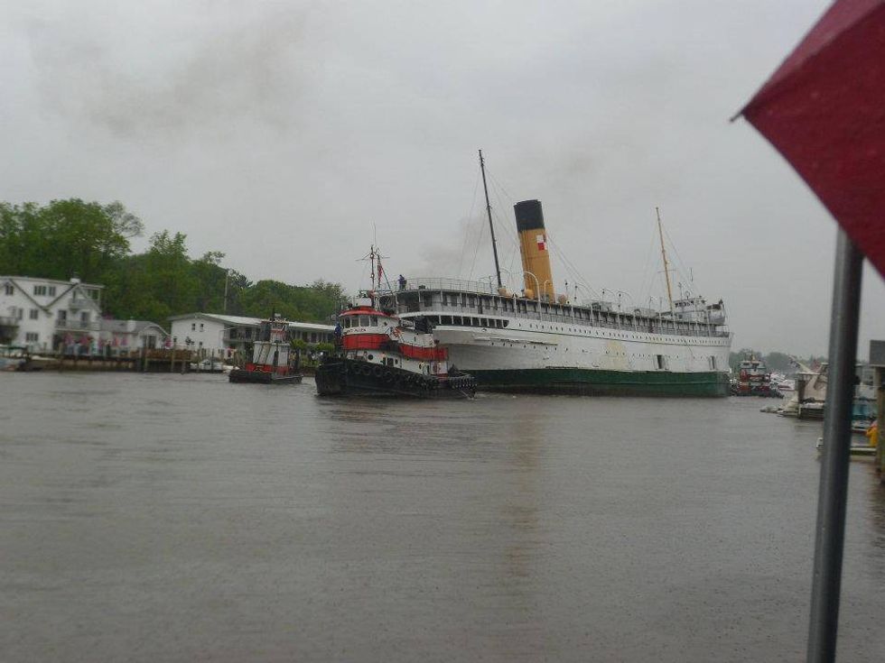 S.S. Keewatin being towed in the Kalamazoo River through Saugatuck in June, 2012
