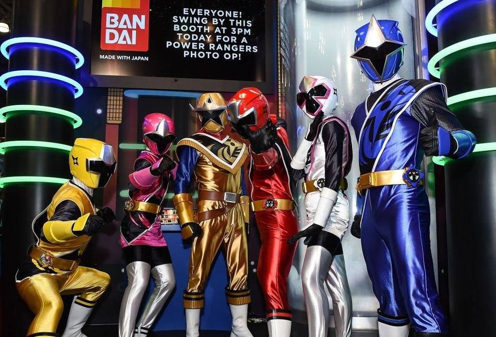 Saban Power Rangers pose with fans during New York Comic Con 2017 Day - 2 on October 6, 2017 in New York City.