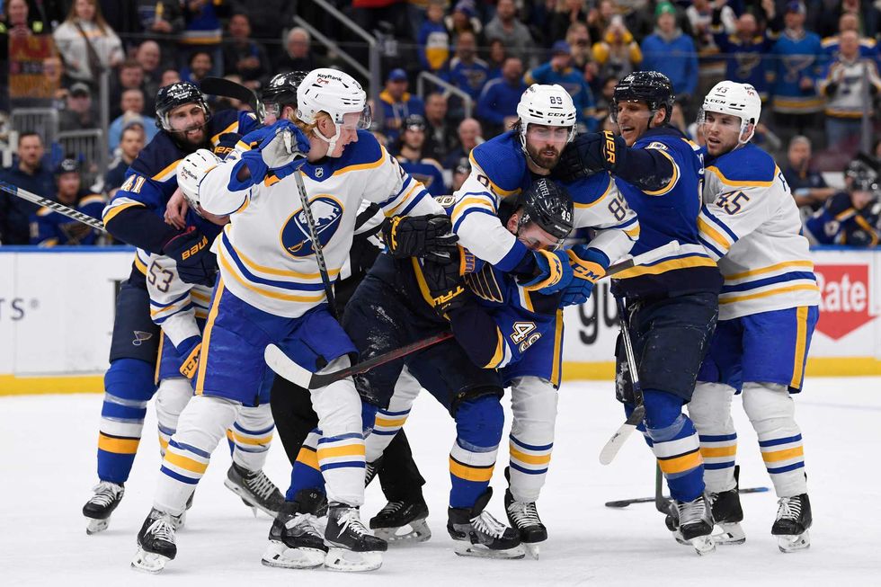Sabres and Blues players get into it after the whistle