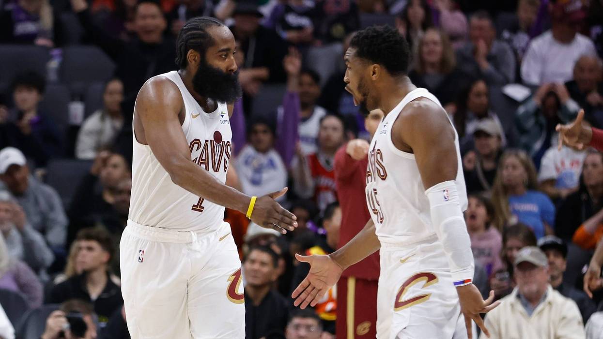 SACRAMENTO, CALIFORNIA - FEBRUARY 07: James Harden #1 of the Cleveland Cavaliers celebrates with Donovan Mitchell #45 after making a three-point shot in the fourth quarter against the Sacramento Kings at Golden 1 Center on February 07, 2026 in Sacramento, California.