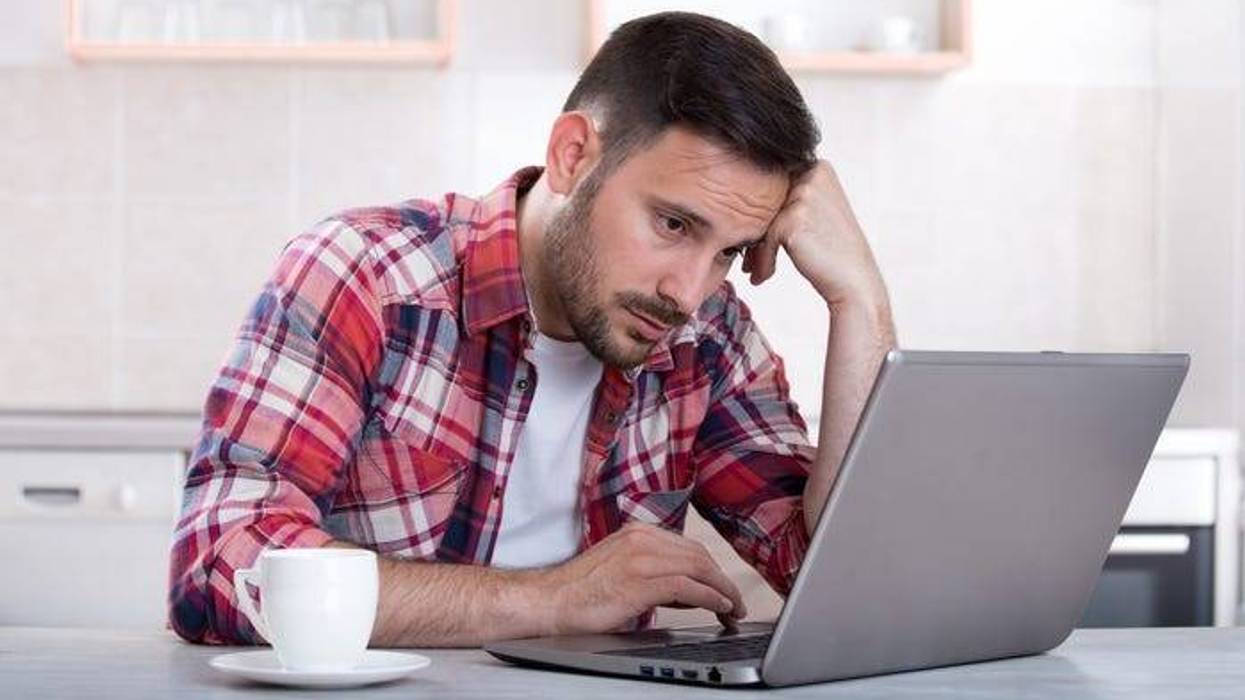 Sad Man at Computer