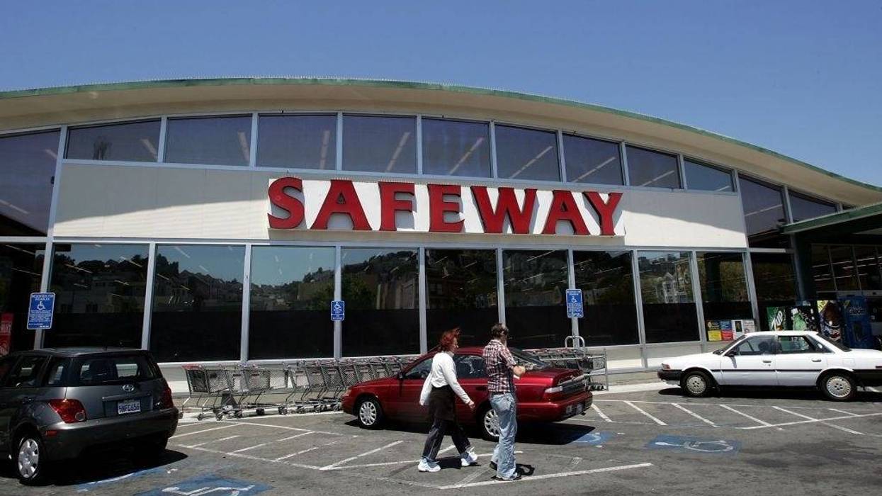 Safeway customers walk in front of a Safeway grocery store July 20, 2006 in San Francisco.