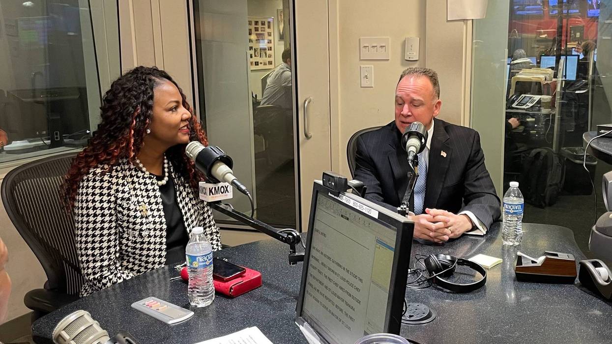saint louis mayor tishaura jones and saint louis police chief robert tracy sit in the kmox studios at microphones