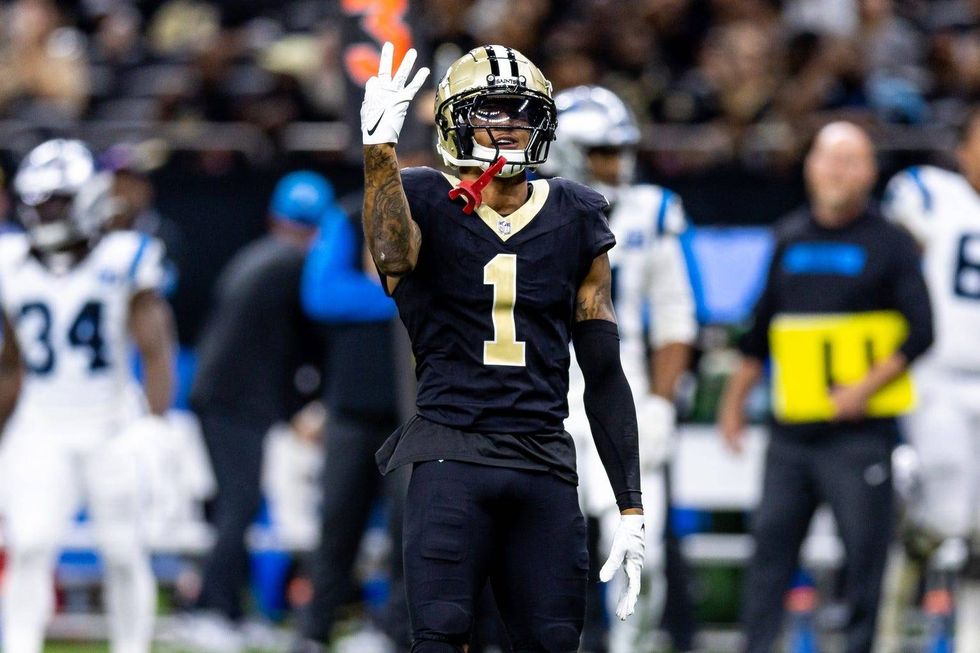Saints CB Alontae Taylor celebrates after a big play during a 2024 game against the Panthers.