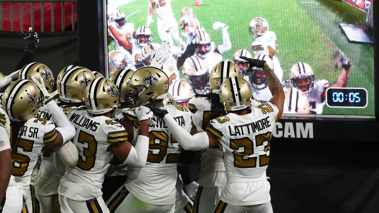 Saints defenders celebrate