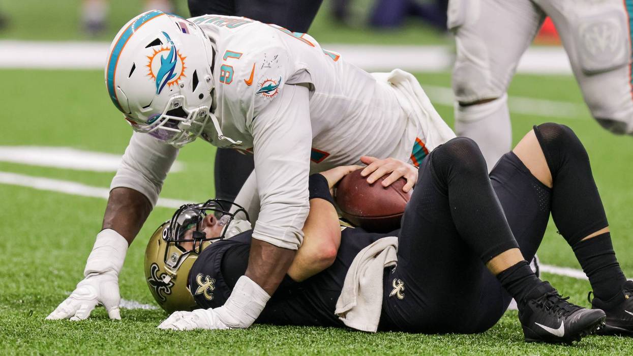 Saints quarterback Ian Book is sacked