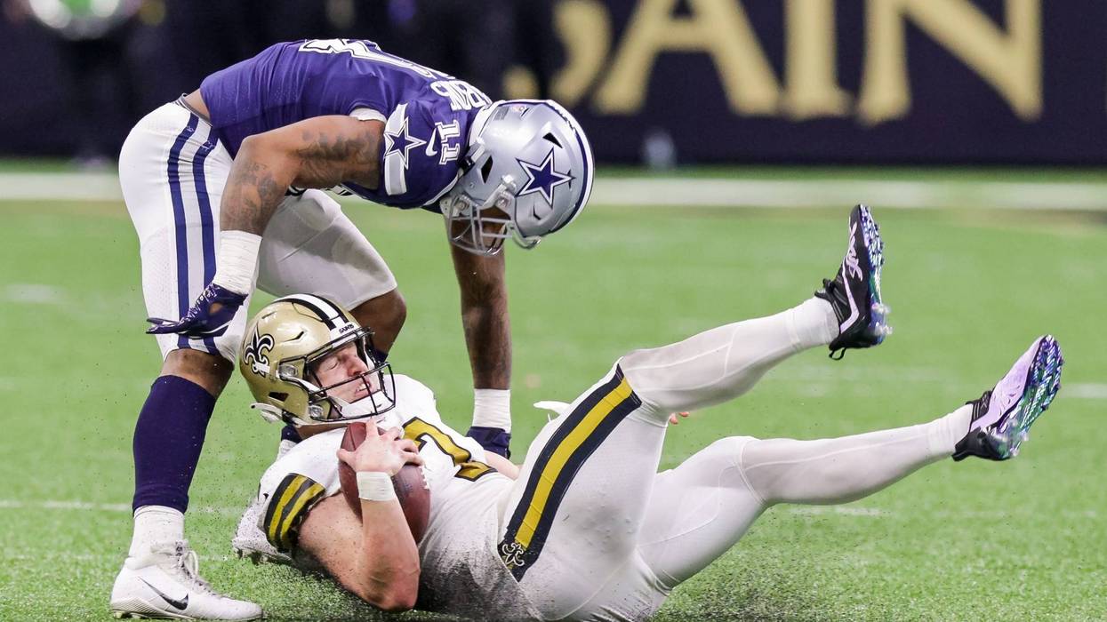 Saints quarterback Taysom Hill gets sacked