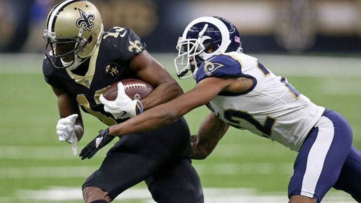 Saints wide receiver Michael Thomas is defended by Rams cornerback Marcus Peters after a catch in the third quarter at the Mercedes-Benz Superdome in New Orleans on Nov. 4, 2018.
