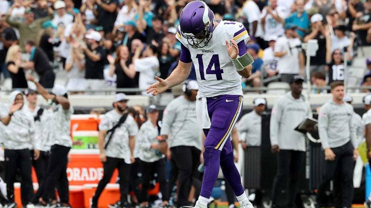 Sam Darnold #14 of the Minnesota Vikings reacts after throwing an interception against the Jacksonville Jaguars during the second quarter at EverBank Stadium on November 10, 2024 in Jacksonville, Florida.