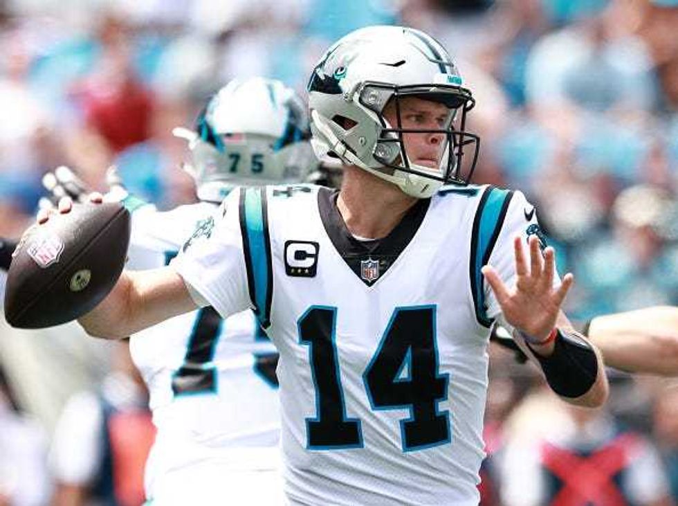 Sam Darnold drops back to pass for the Panthers
