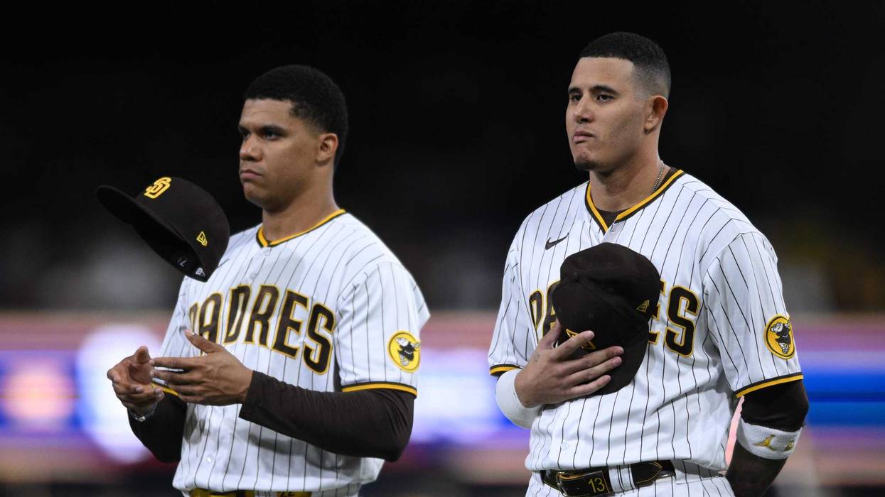 San Diego Padres right fielder Juan Soto (22) and third baseman Manny Machado (13) before the game against the Los Angeles Dodgers during game four of the NLDS