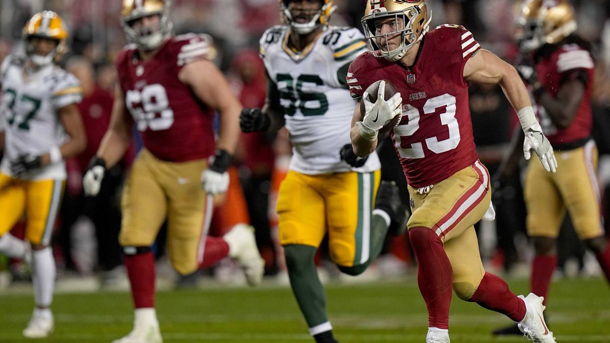 San Francisco 49ers running back Christian McCaffrey (23) scores a touchdown on a 39-yard run during the third quarter of their NFC divisional playoff game Saturday, January 20, 2024 at Levi Stadium in Santa Clara, California. The San Francisco 49ers beat the Green Bay Packers 24-21.