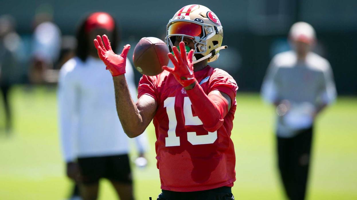 San Francisco 49ers wide receiver Jauan Jennings (15) catches a pass during a mandatory minicamp at the team’s headquarters.