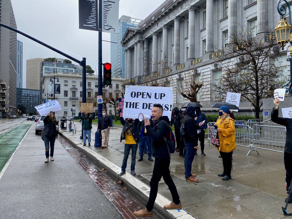 San Francisco Bartender Giovanni Cincotta leads a protest outside City Hall.
