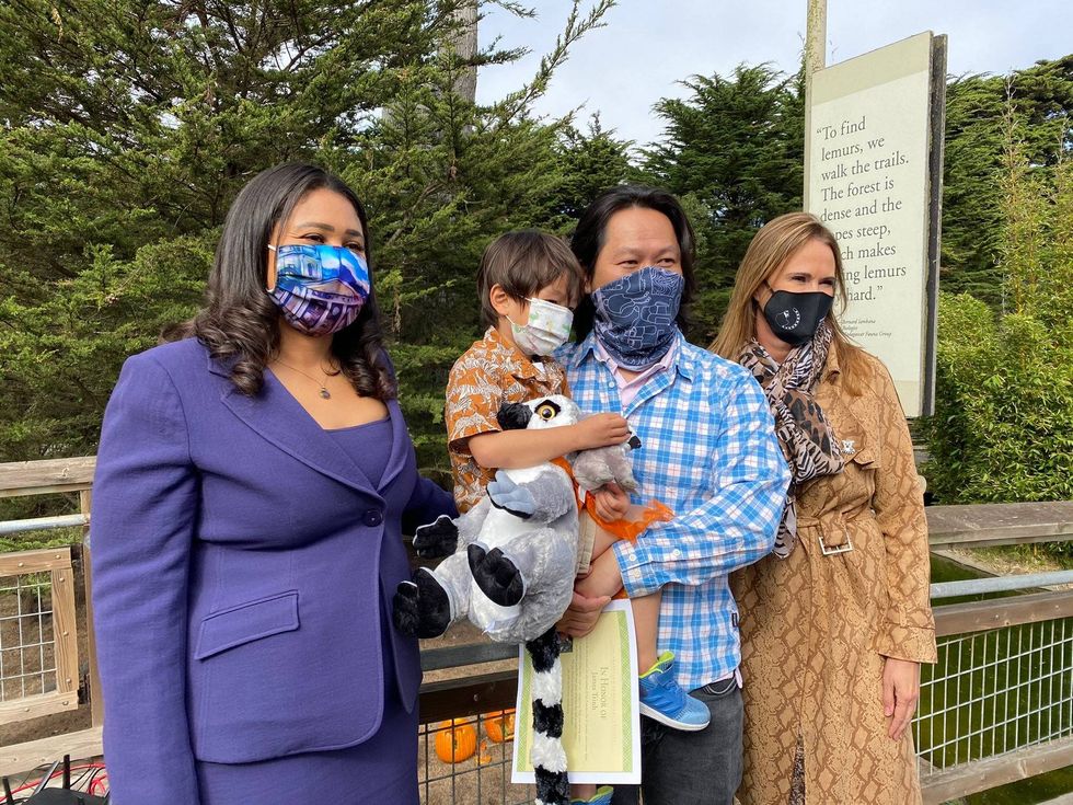 San Francisco city officials gather at the zoo to honor the boy who found Maki, the stolen lemur.