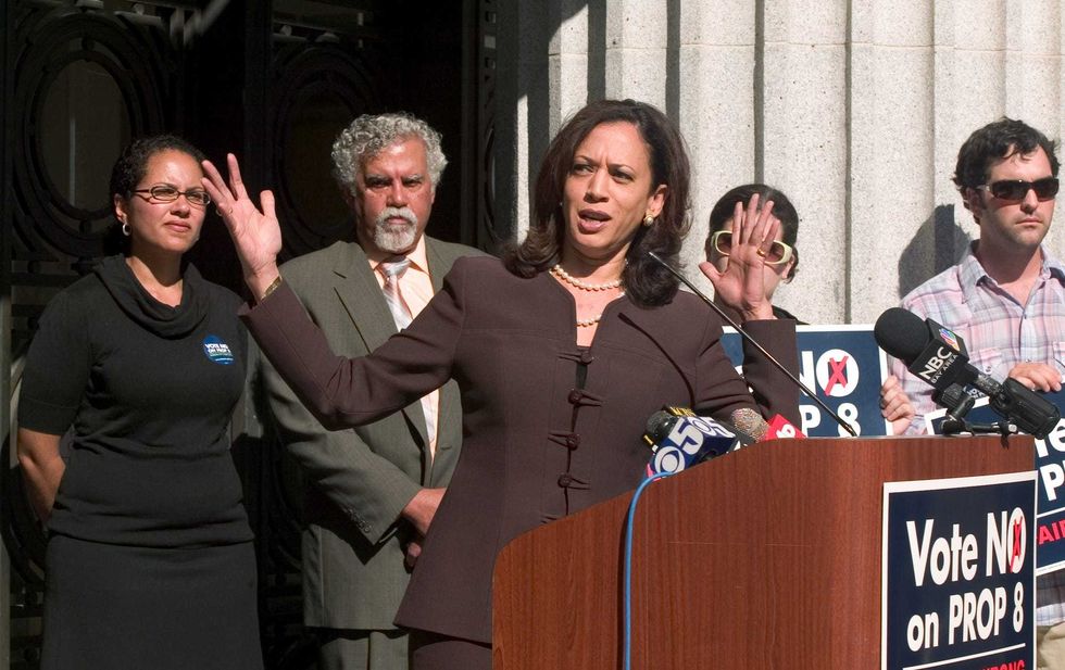 San Francisco District Attorney Kamala Harris, center, tells the audience that California