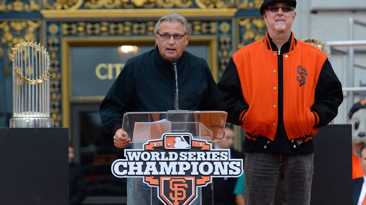 San Francisco Giants broadcast team of Duane Kuiper (L) and Mike Krukow (R) speaks to the fans during the Giants' victory parade and celebration on October 31, 2012 in San Francisco, California.