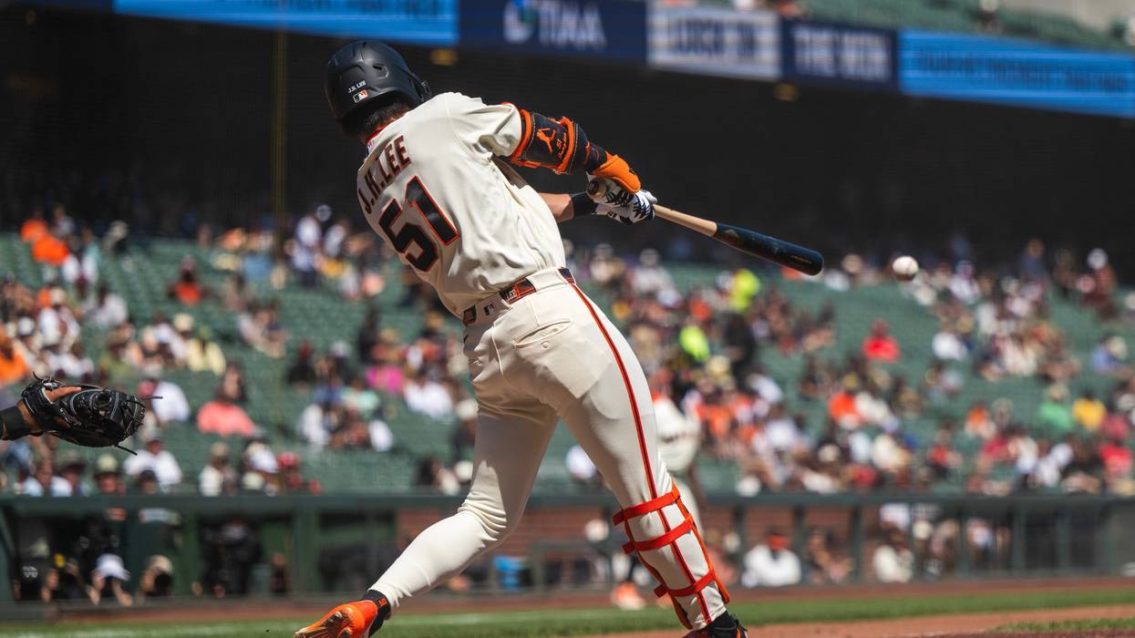 Whitcomb's double caps Giants' 6-run rally in a 7-6 victory over the Cardinals