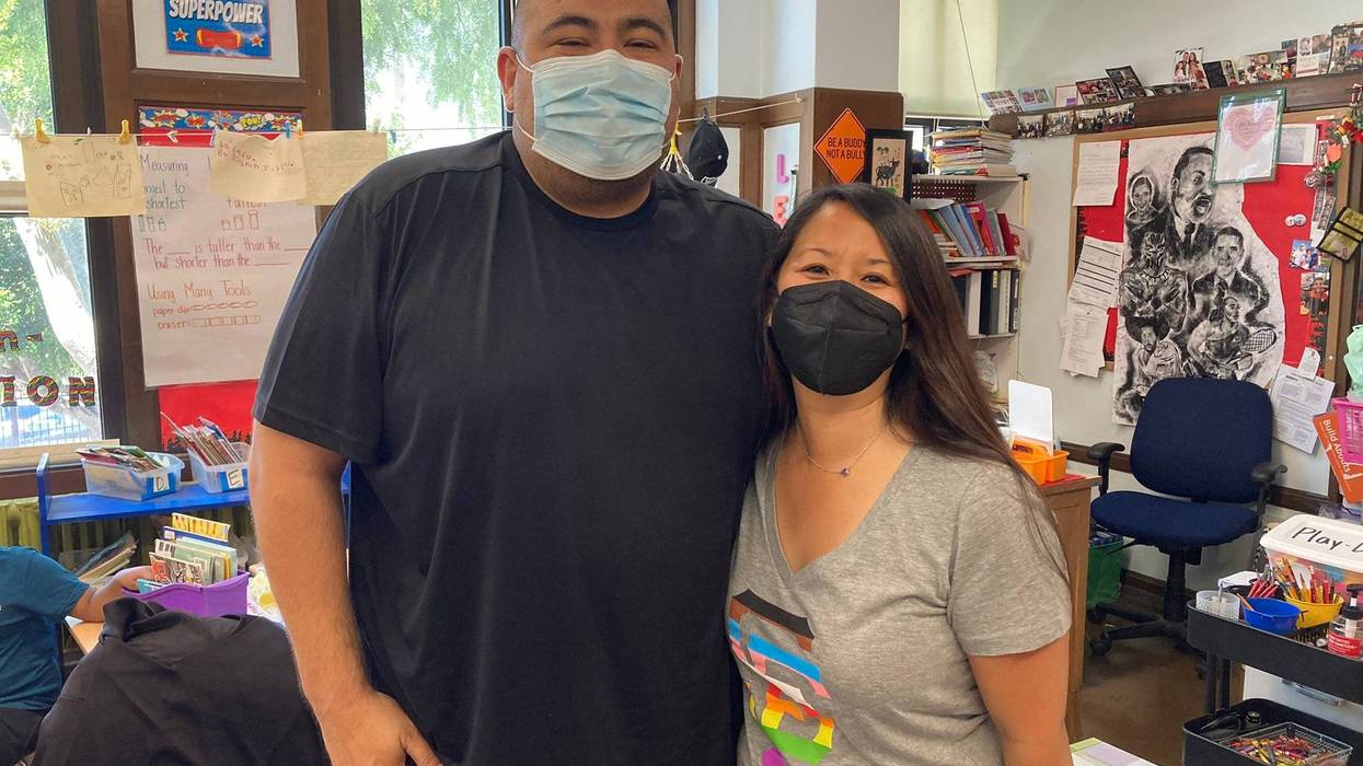 San Francisco public school teachers Vincent Reyes (L) and Cecily Ina-Lee (R) helped elderly residents in a Fillmore District apartment building evacuate their homes on Friday, according to school district officials.