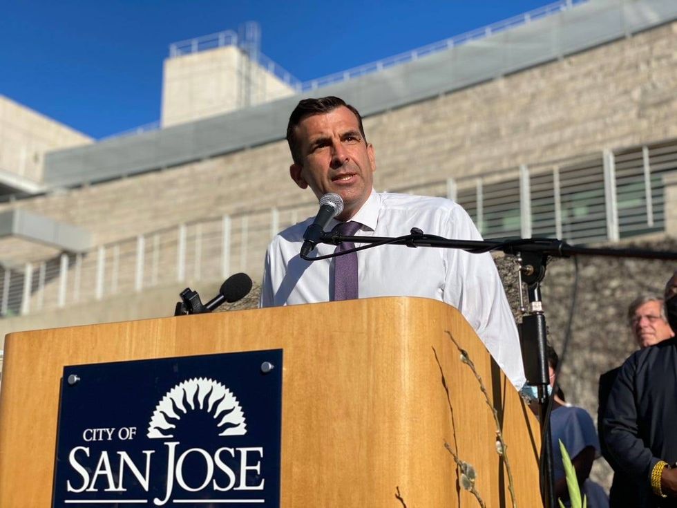 San Jose Mayor Sam Liccardo offers words of comfort and condolence at City Hall during a vigil mourning the nine lives lost at Wednesday