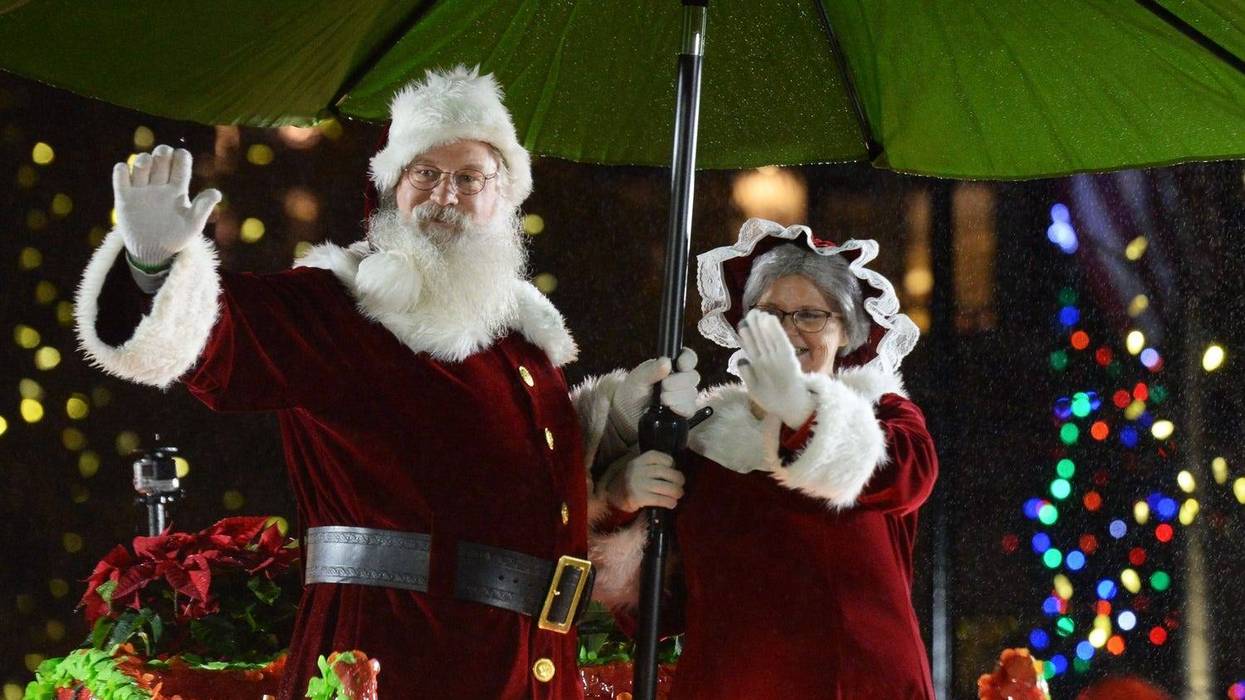 Santa and Mrs. Claus at the Greenville Poinsettia Christmas Parade 2018 in downtown Greenville.