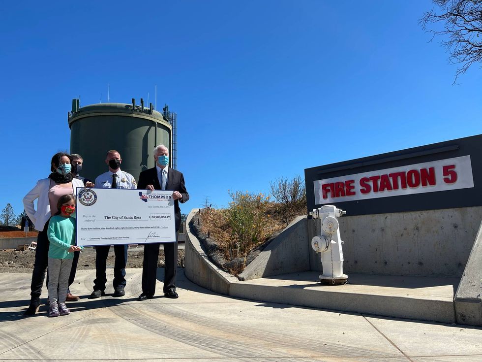 Santa Rosa City Councilmember Victoria Fleming, Mayor Chris Rogers, Fire Chief Scott Westrope and U.S. Congressman Mike Thompson stand at the sight of the city