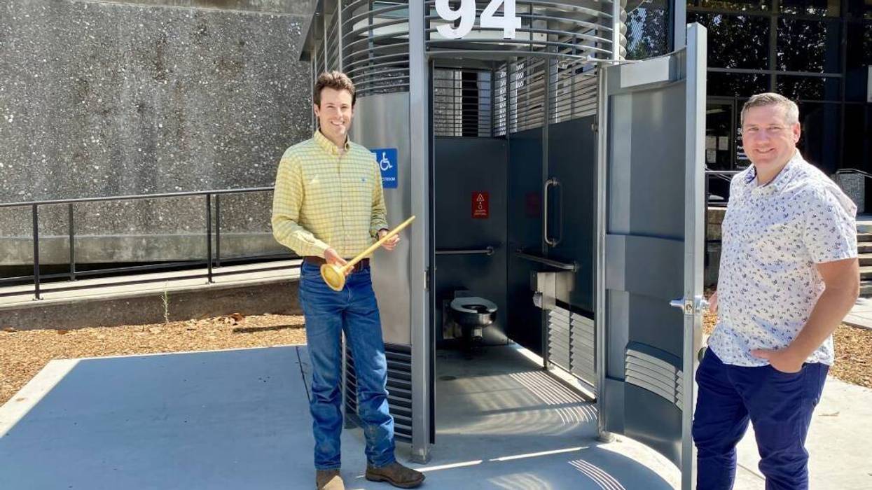 Santa Rosa Councilman Jack Tibbetts (left) and Mayor Chris Rogers celebrate the opening of the "Portland Loo".