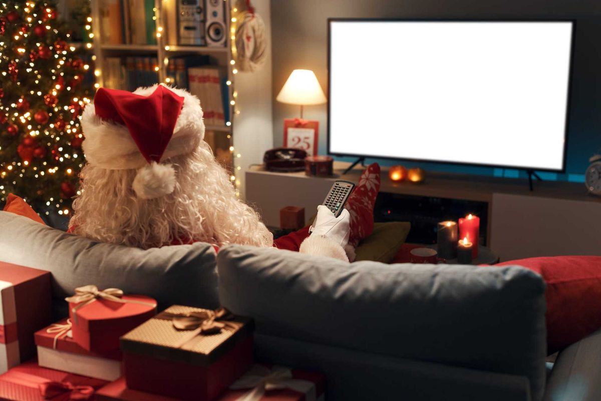 Santa watching Christmas movies.