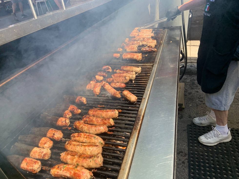 Sausages on a grill at the Italian Market Festival