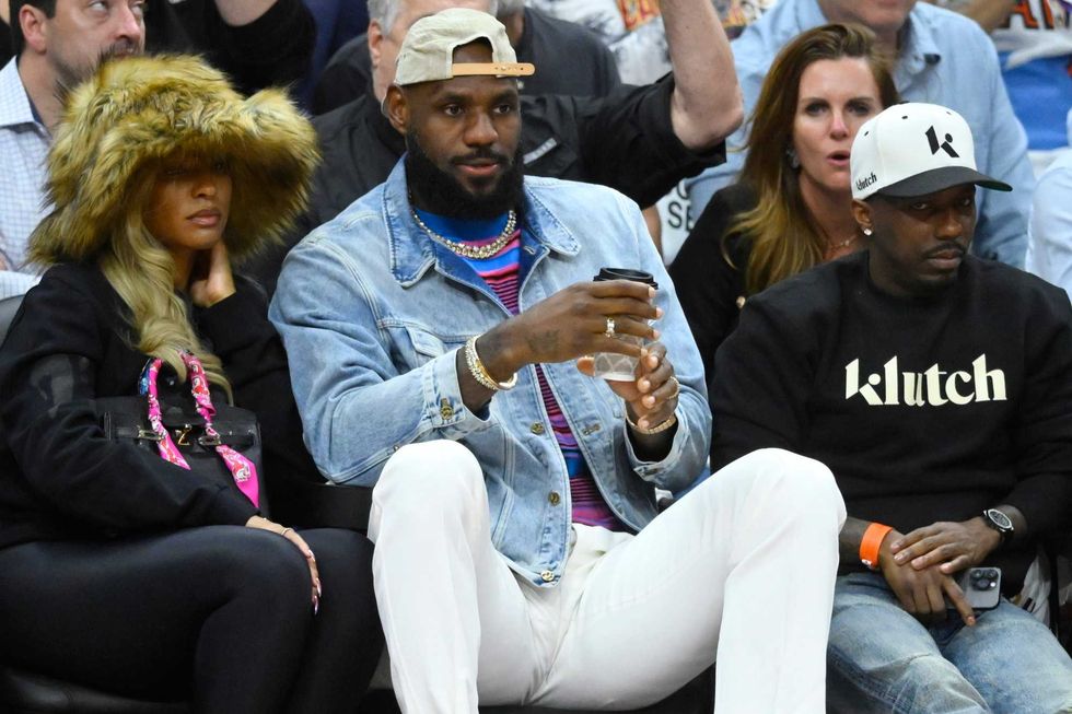 Savannah James, LeBron James and Rich Paul sit in the front in the fourth quarter of game four of the second round for the 2024 NBA playoffs between the Cleveland Cavaliers and the Boston Celtics at Rocket Mortgage FieldHouse.