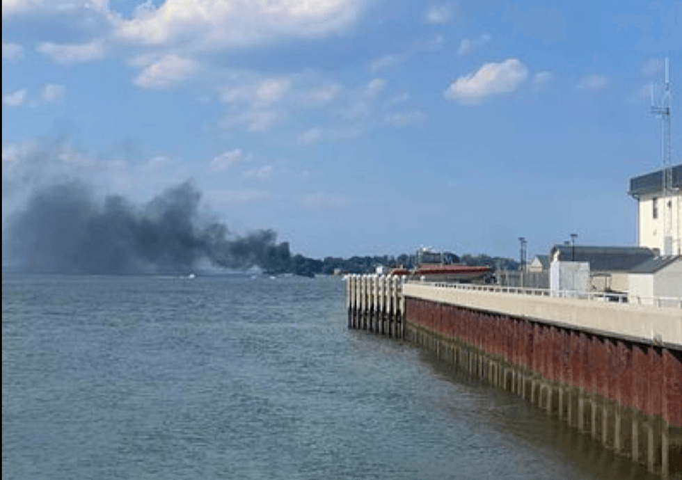 Scene from ashore of boat explosion