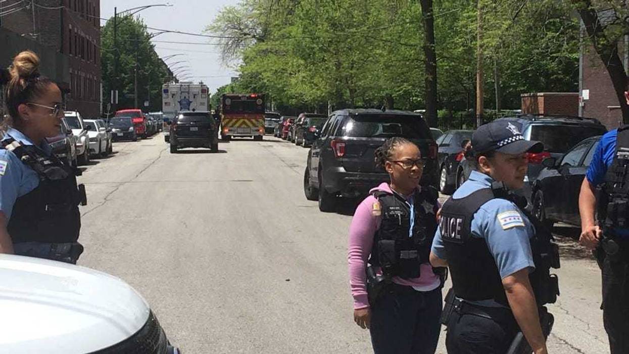 Scene of an officer-involved shooting at 61st & Dorchester Wednesday.