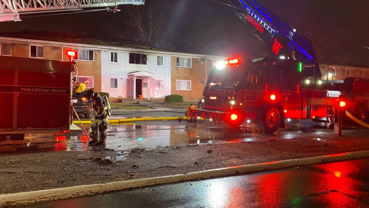 Scene of apartment fire and Warren firefighters