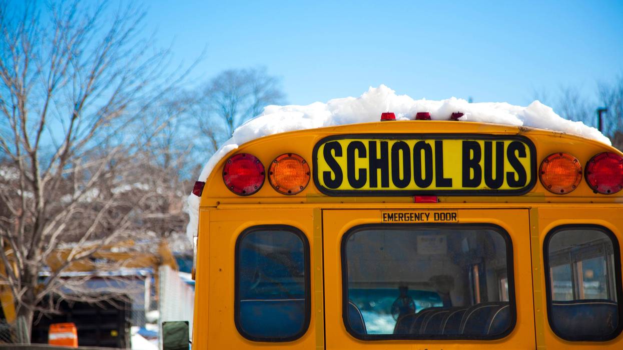 School bus with snow on the roof