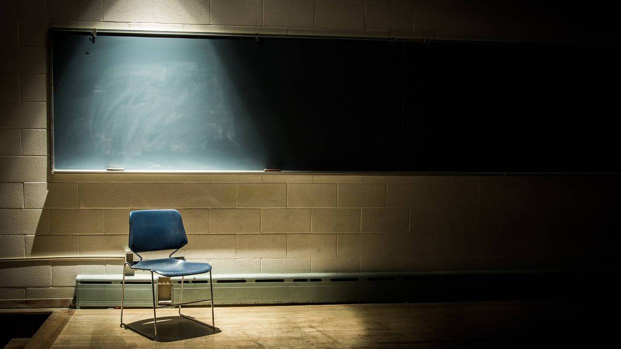 School chair under a spotlight