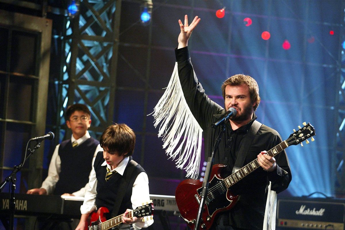 "School of Rock" cast members Jack Black (R), Robert Tsai (L) and Joey Gaydos Jr appear on "The Tonight Show with Jay Leno"