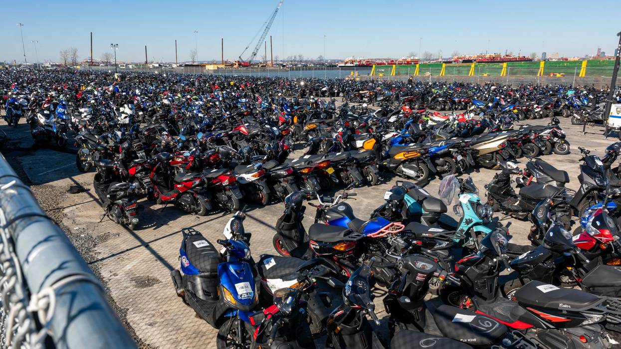 Scooters and motorcycles seized from the streets are stored at a tow yard in Brooklyn on February 5, 2024
