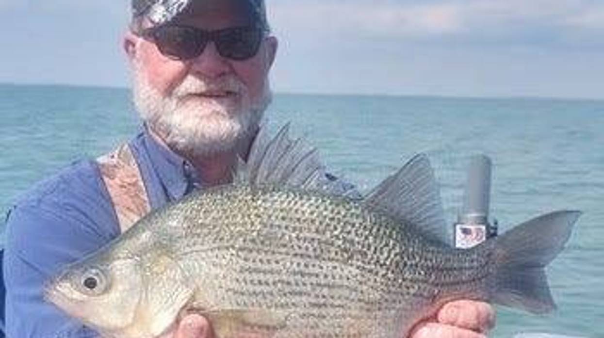 Scott Smith with state record white perch