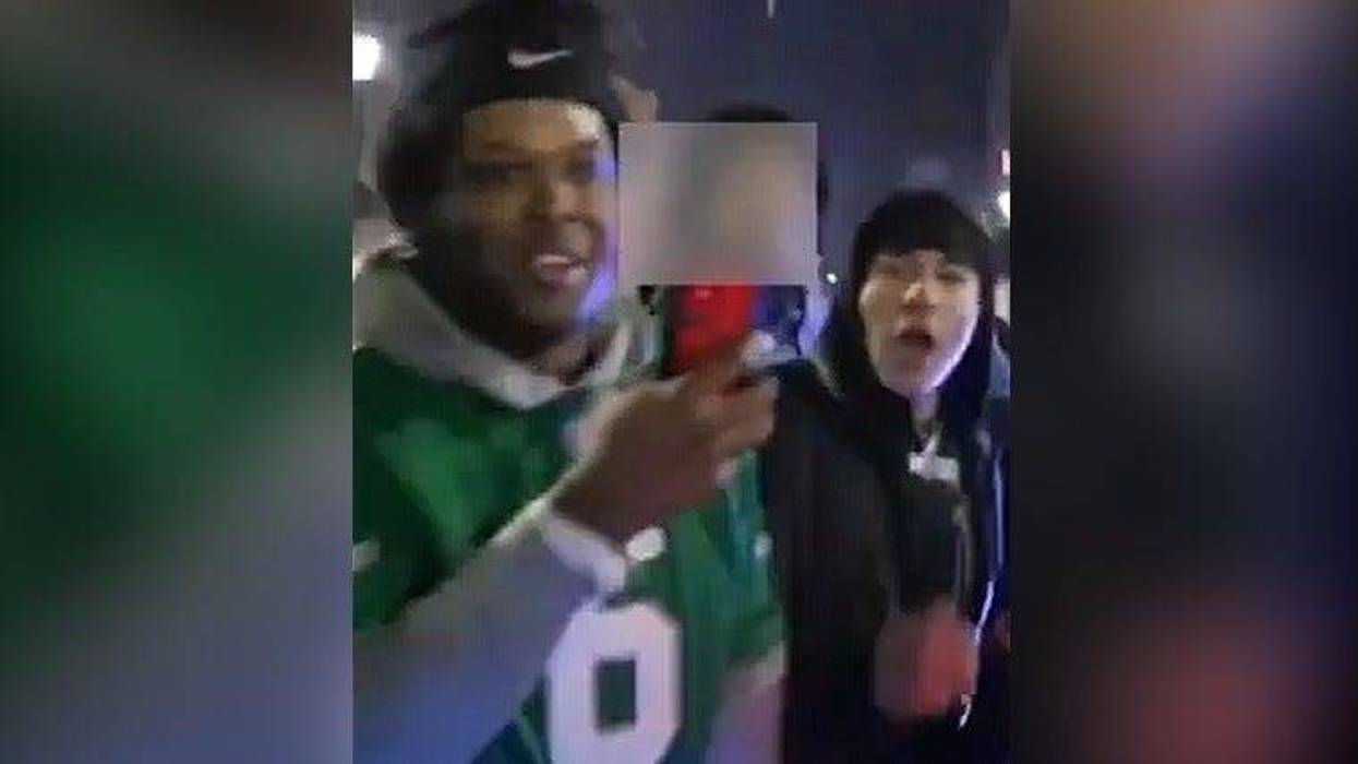 Screenshot of two men police say assaulted an officer Sunday, Feb. 9 during Super Bowl celebrations on Broad and Chestnut streets