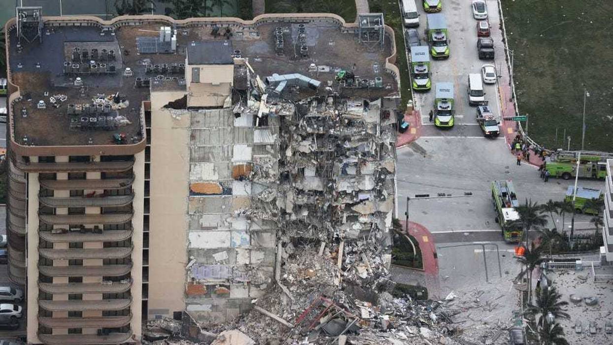 Search and Rescue personnel work after the partial collapse of the 12-story Champlain Towers South condo building on June 24, 2021 in Surfside, Florida.