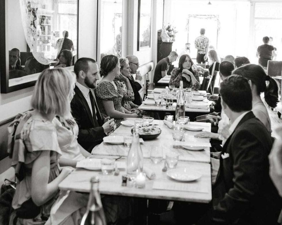 Seated guests inside of Lula Cafe.