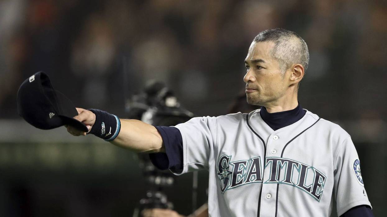 Seattle Mariners right fielder Ichiro Suzuki (51) tips his cap after being removed from the game during the eighth inning against the Oakland Athletics at Tokyo Dome.