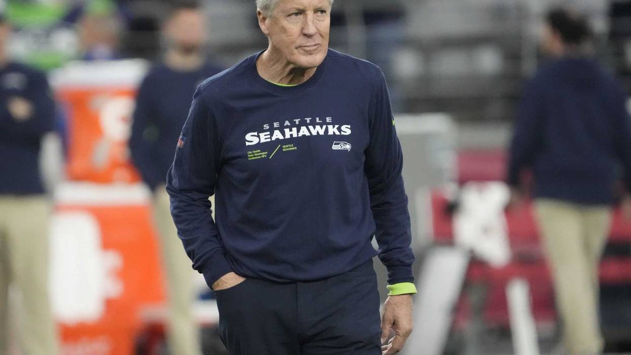 Seattle Seahawks head coach Pete Carroll watches his team warm up before playing against the Arizona Cardinals in Glendale on Jan. 7, 2024.