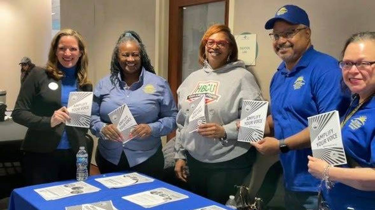 Secretary Benson and a community group at the Northwest Activities Center early voting site.