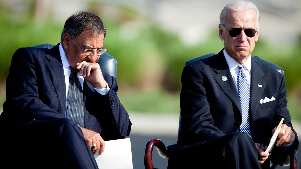 Secretary of Defense Leon E. Panetta (L) and Vice President Joseph R. Biden listen during a memorial service at the Pentagon September 11, 2011 in Arlington, Virginia.