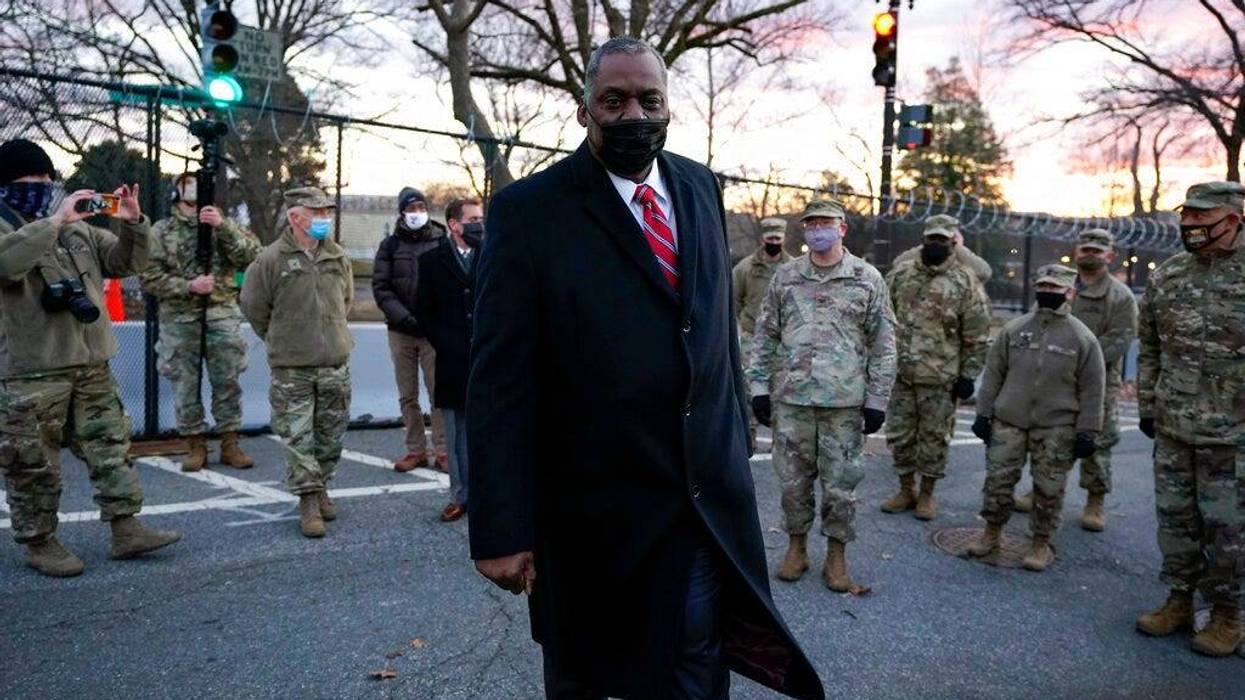 Secretary of Defense Lloyd Austin visits National Guard troops deployed at the U.S. Capitol and its perimeter, Friday, Jan. 29, 2021 on Capitol Hill in Washington. (AP Photo/Manuel Balce Ceneta, Pool)