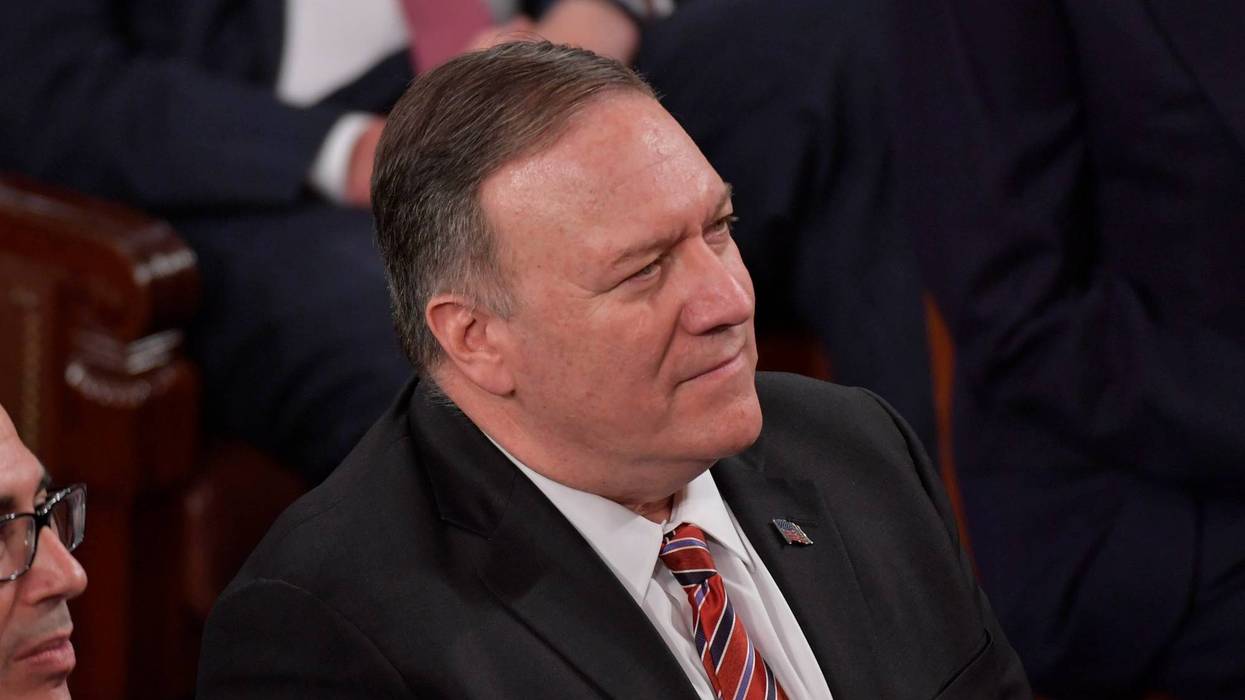 Secretary of State Mike Pompeo listens as President Donald J. Trump delivers the State of the Union address from the House chamber of the United States Capitol in Washington.