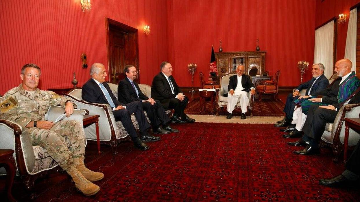 Secretary of State Mike Pompeo meets with, from left, Resolute Support NATO Base Commander Gen. Austin Scott Miller, Afghanistan Envoy Zalmay Khalilzad, U.S. Ambassador to Afghanistan John Bass, Pompeo, Afghan President Ashraf Ghani, Afghan Chief Executiv